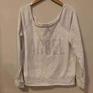 VS Soft ANGEL off-shoulder Sequin Sweater